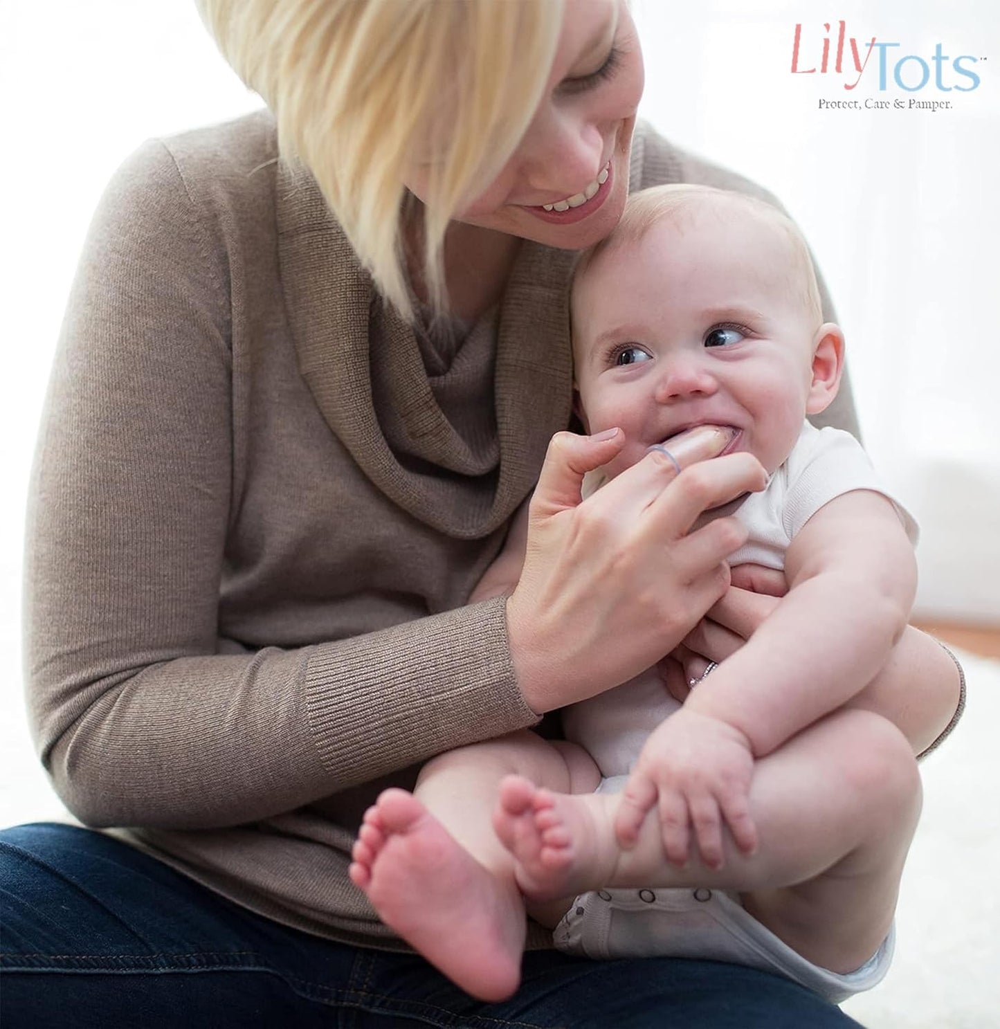 BPA-free silicone baby toothbrush fits on parent fingertip - Little Rooots